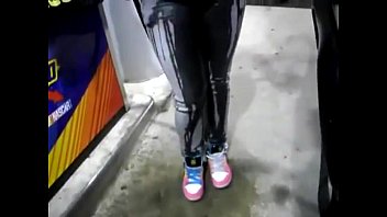 desperate girl wetting pee jeans while pumping gas