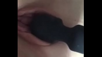 Redhead pussy with a black wand