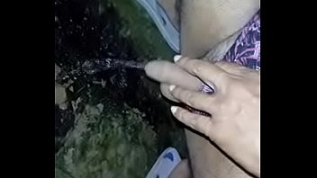 Pissing on ground in the night